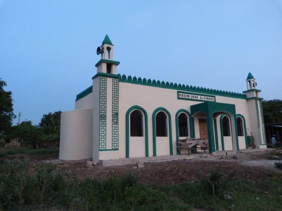 Masjid Umar Al-Farooq, a completed mosque with green arches and two minarets, built by Helping Hands